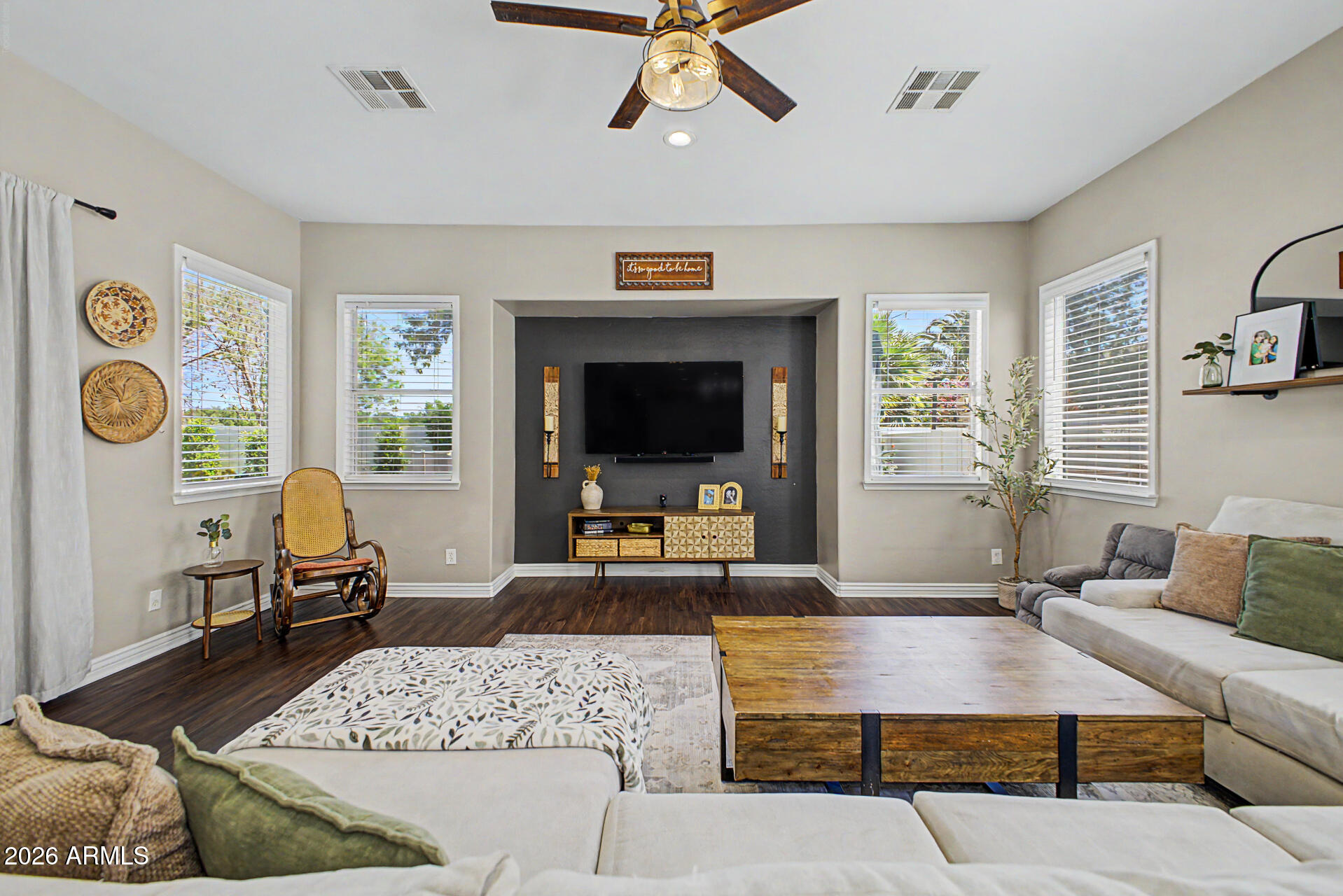 2065 South Porter Street Gilbert, AZ 85295 - Photo 7 of 36 a living room with furniture and a flat screen tv