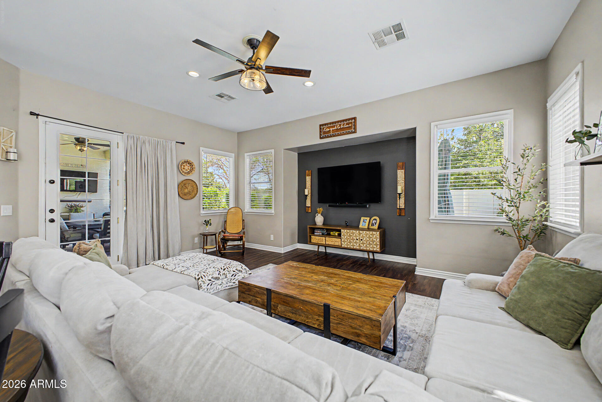2065 South Porter Street Gilbert, AZ 85295 - Photo 8 of 36 a living room with furniture and a flat screen tv