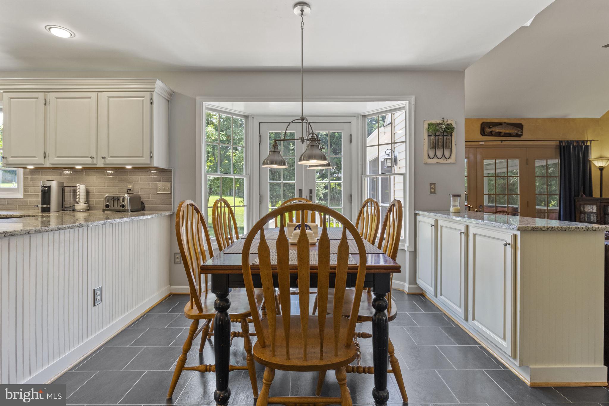 Eat-in kitchen also leads to flagstone patio
