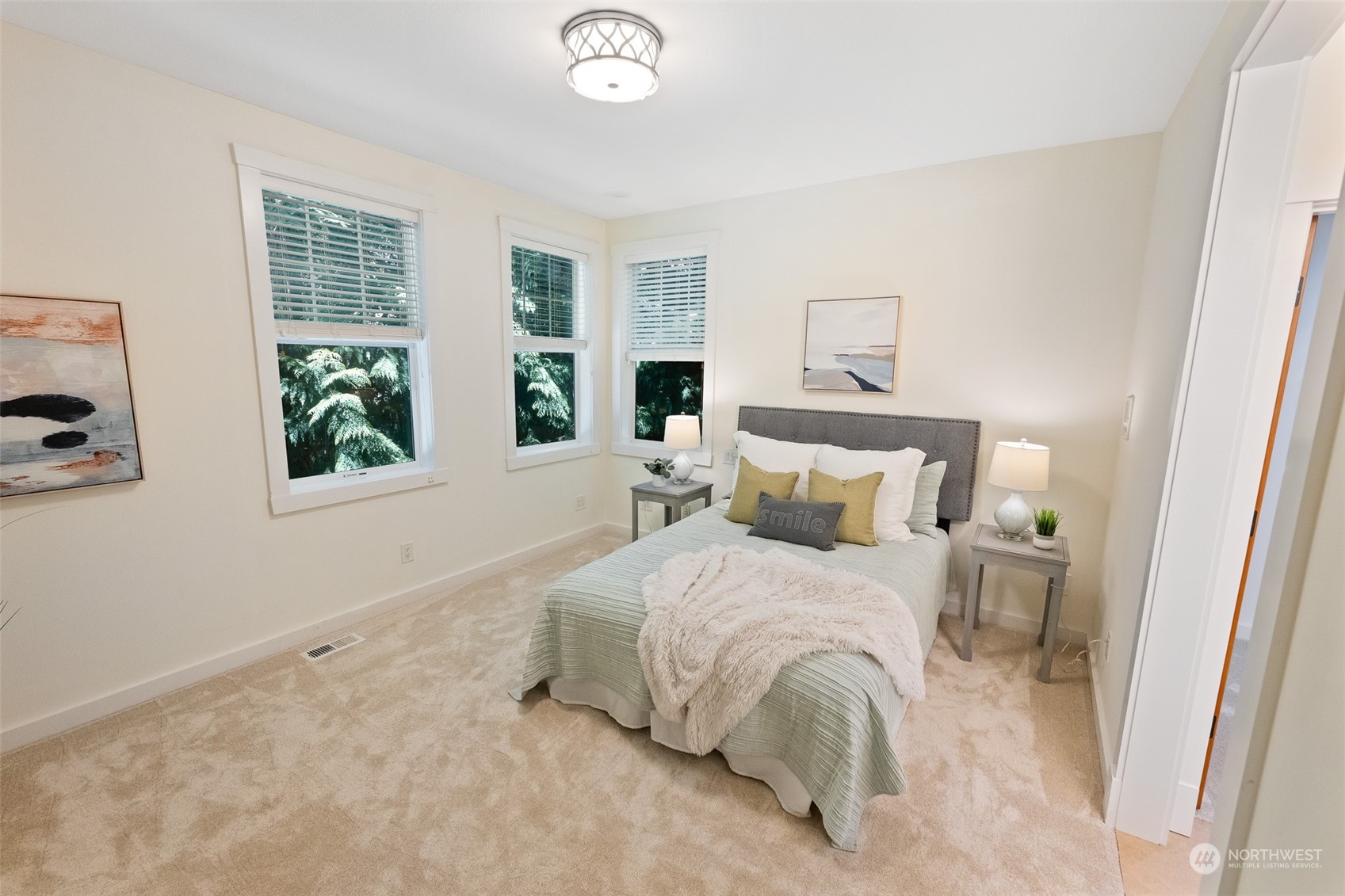 5119 Saddleback Road Northwest Gig Harbor, WA 98332 - Photo 22 of 40 a bedroom with a bed and window