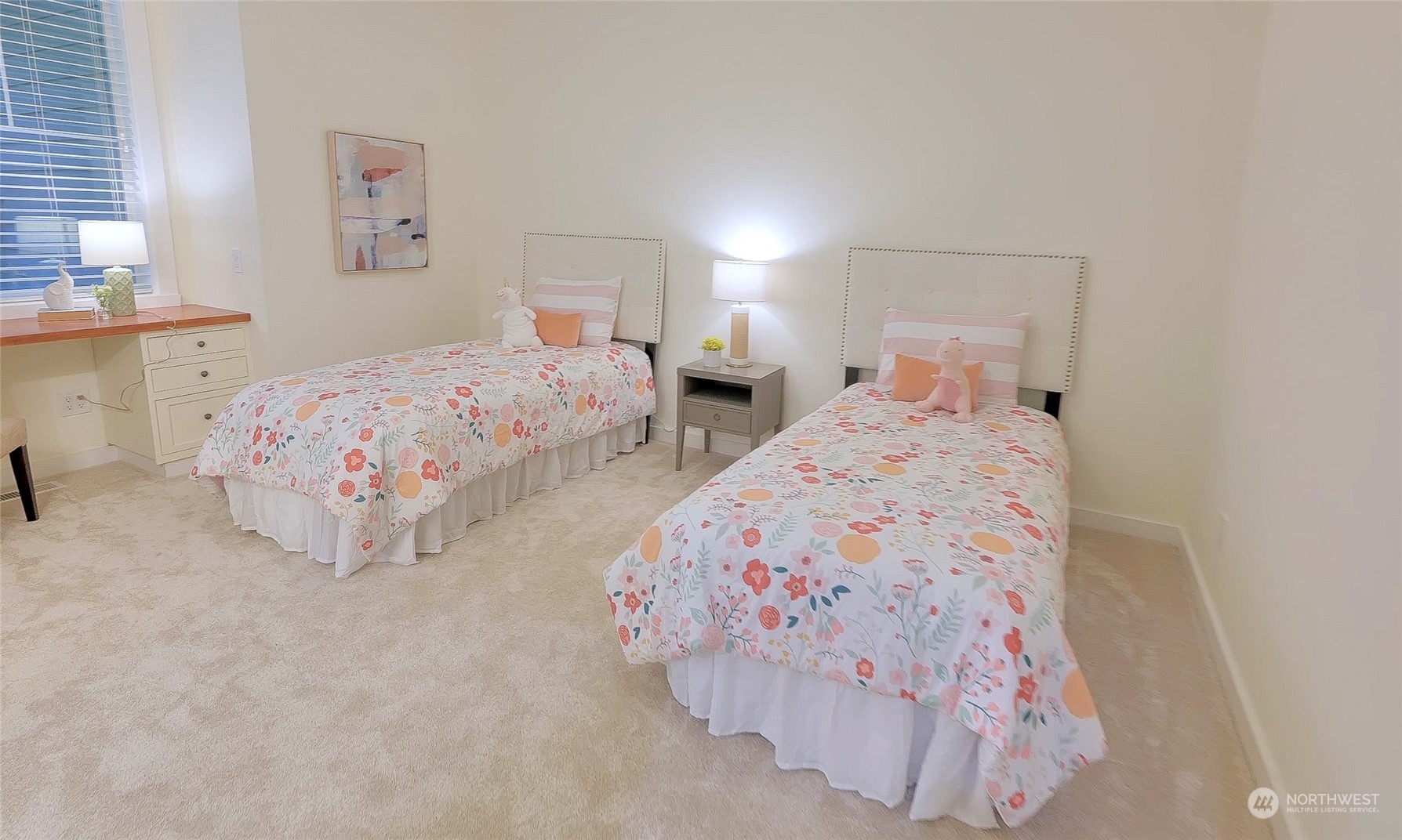 5119 Saddleback Road Northwest Gig Harbor, WA 98332 - Photo 25 of 40 a bedroom with two beds and a lamp on dresser