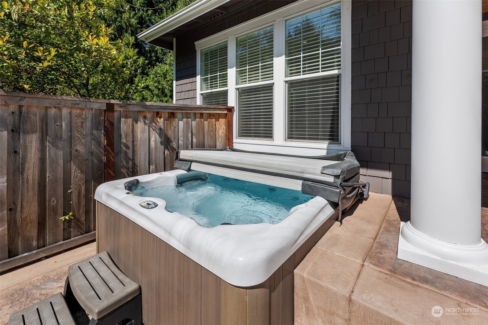 5119 Saddleback Road Northwest Gig Harbor, WA 98332 - Photo 36 of 40 a view of a house with a tub and wooden fence