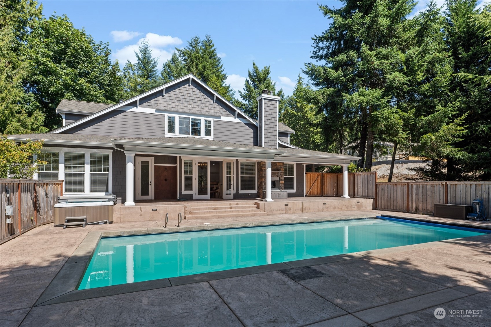 5119 Saddleback Road Northwest Gig Harbor, WA 98332 - Photo 4 of 40 a front view of house with yard and green space