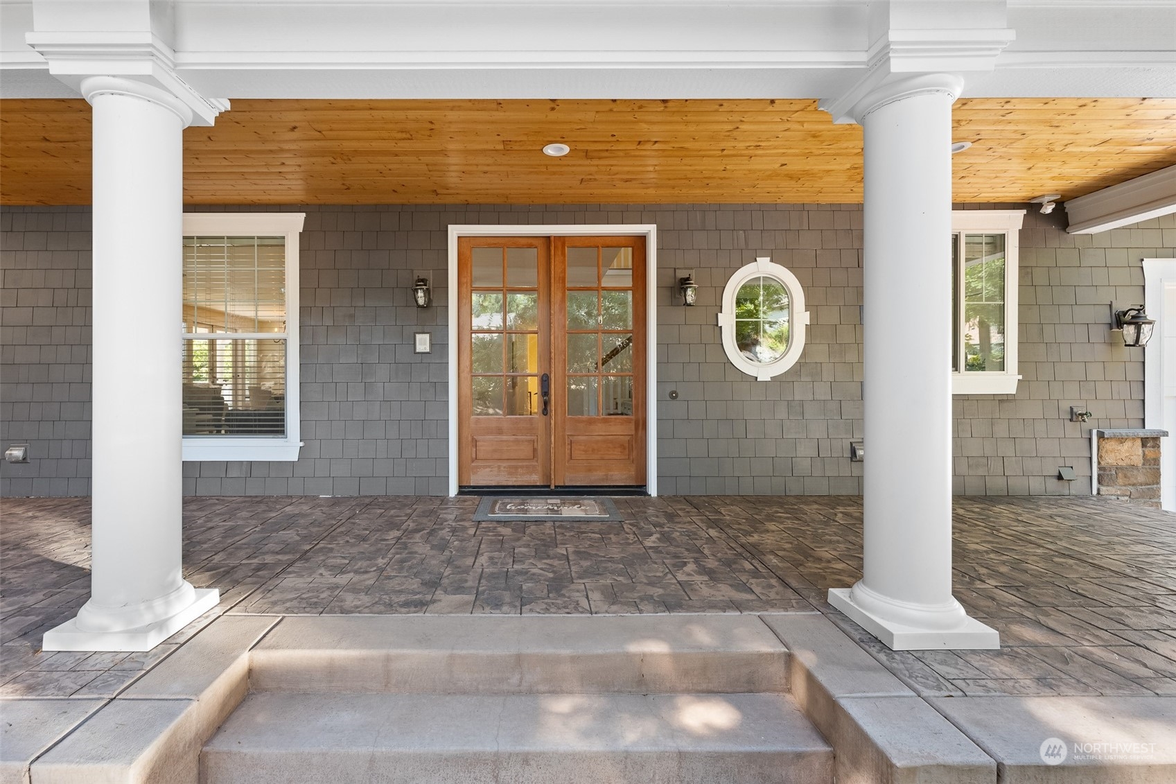 5119 Saddleback Road Northwest Gig Harbor, WA 98332 - Photo 6 of 40 a front view of a house with a shower