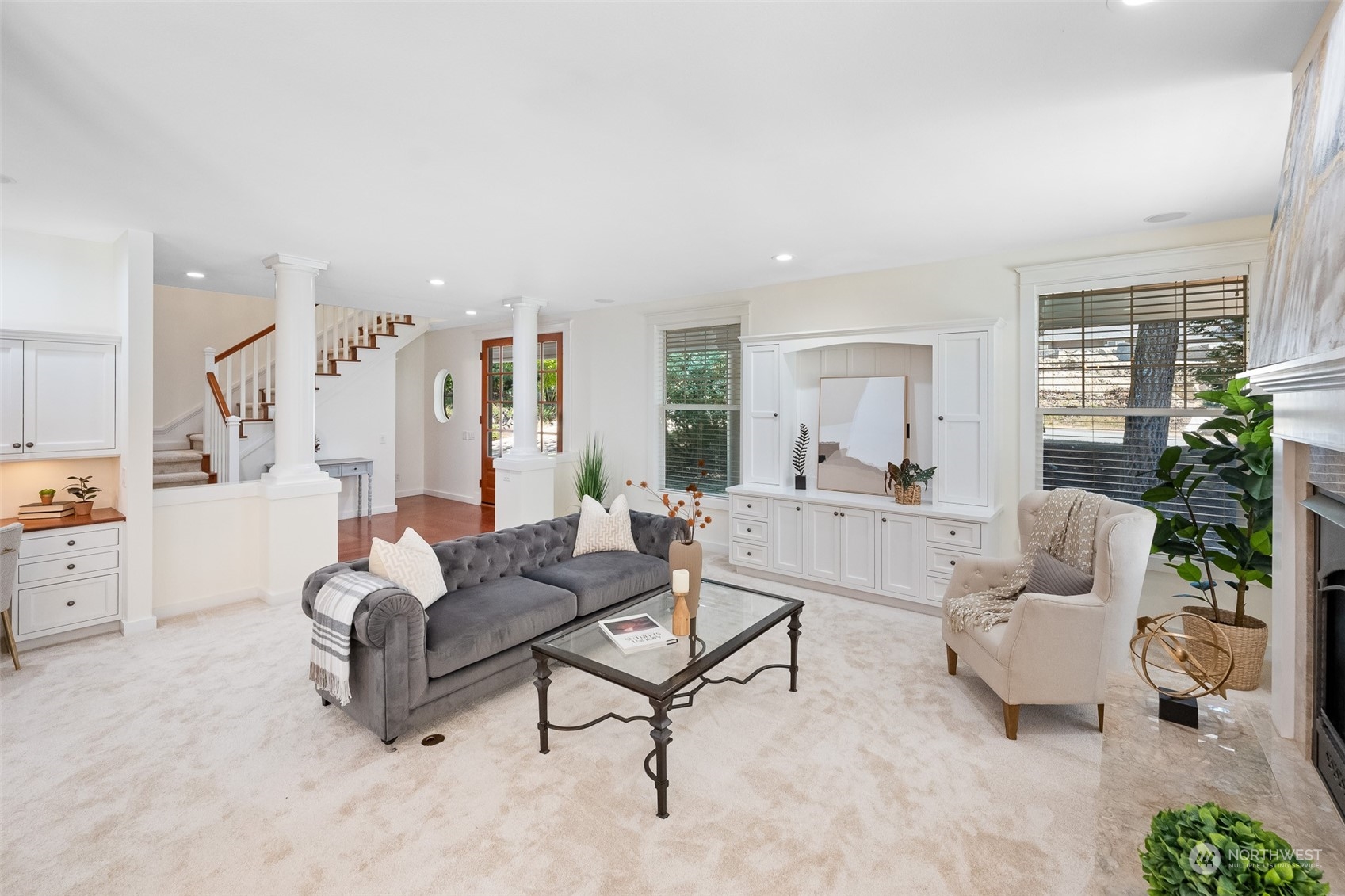 5119 Saddleback Road Northwest Gig Harbor, WA 98332 - Photo 10 of 40 a living room with furniture and a large window