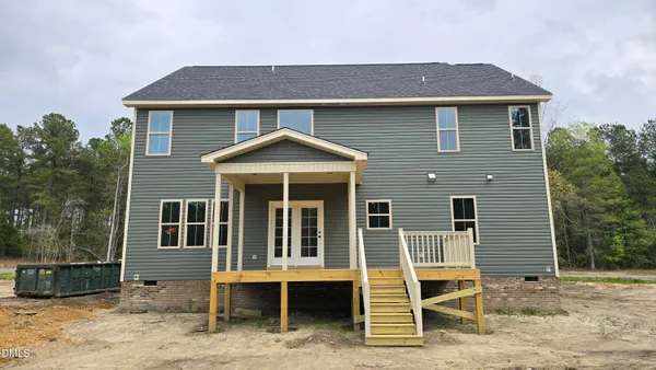 a front view of a house with a porch