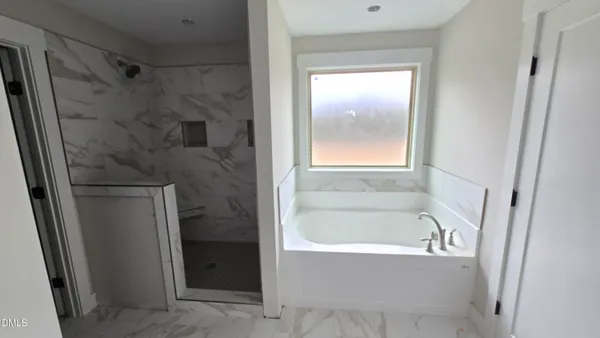 a bathroom with a bathtub