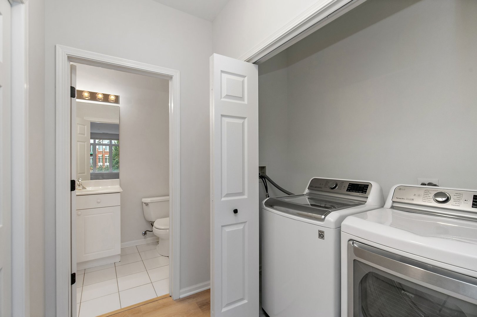 640 McHenry Road, Unit 303 Wheeling, IL 60090 - Photo 17 of 20 a utility room with dryer and washer