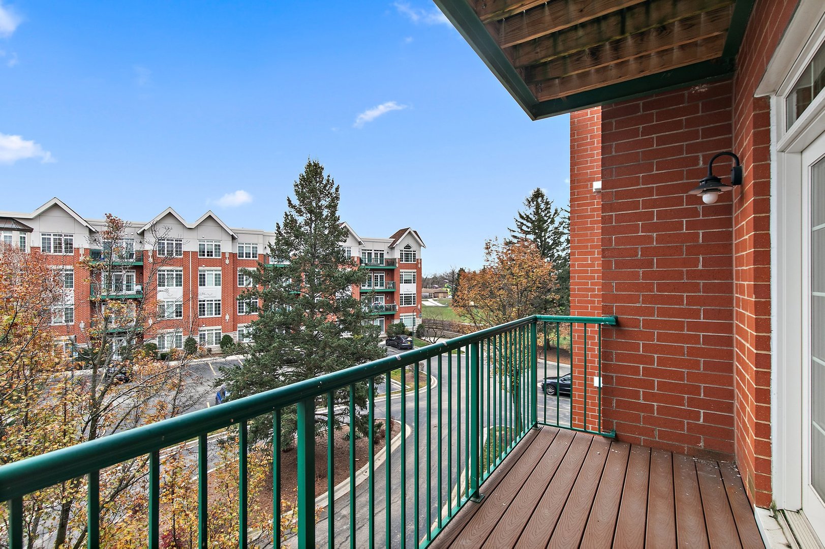 640 McHenry Road, Unit 303 Wheeling, IL 60090 - Photo 18 of 20 a view of city from a balcony