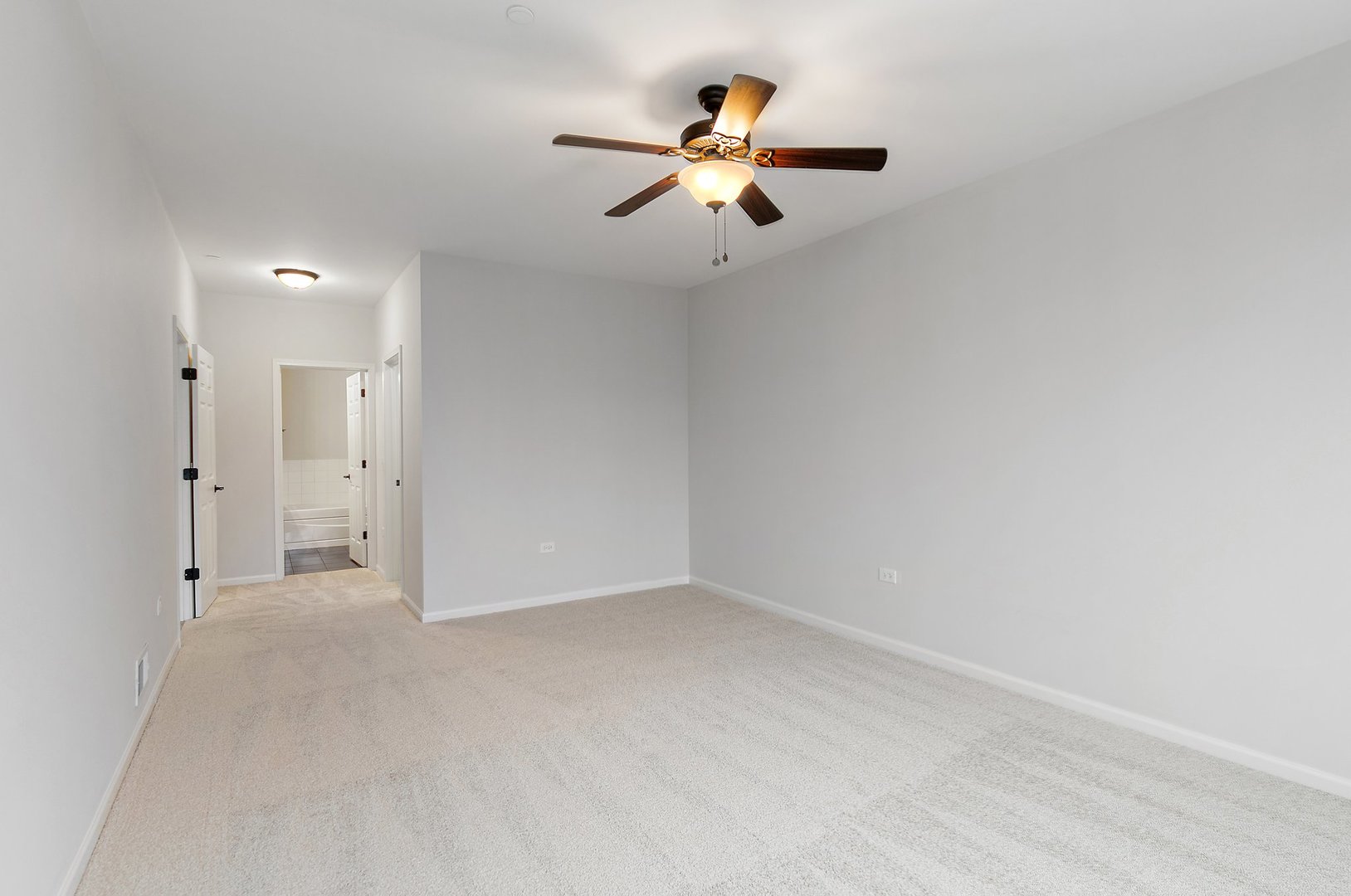 640 McHenry Road, Unit 303 Wheeling, IL 60090 - Photo 9 of 20 a view of an empty room