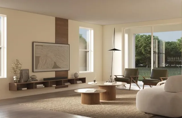 a living room with furniture and large window