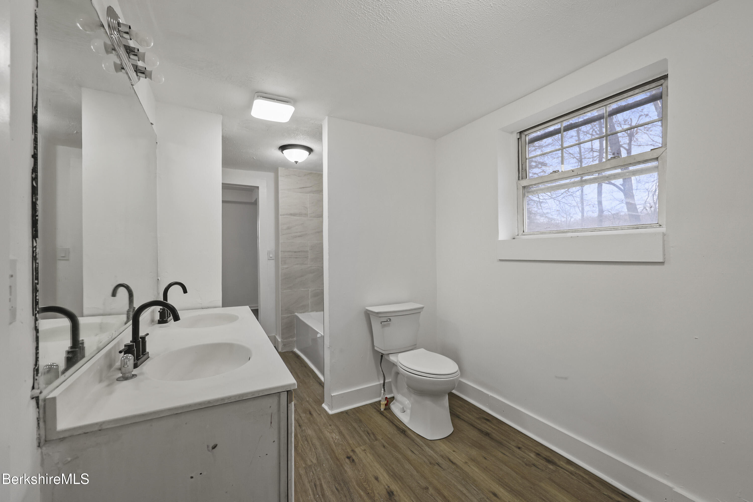 41 Prospect Street North Adams, MA 01247 - Photo 19 of 34 a bathroom with a sink and a mirror