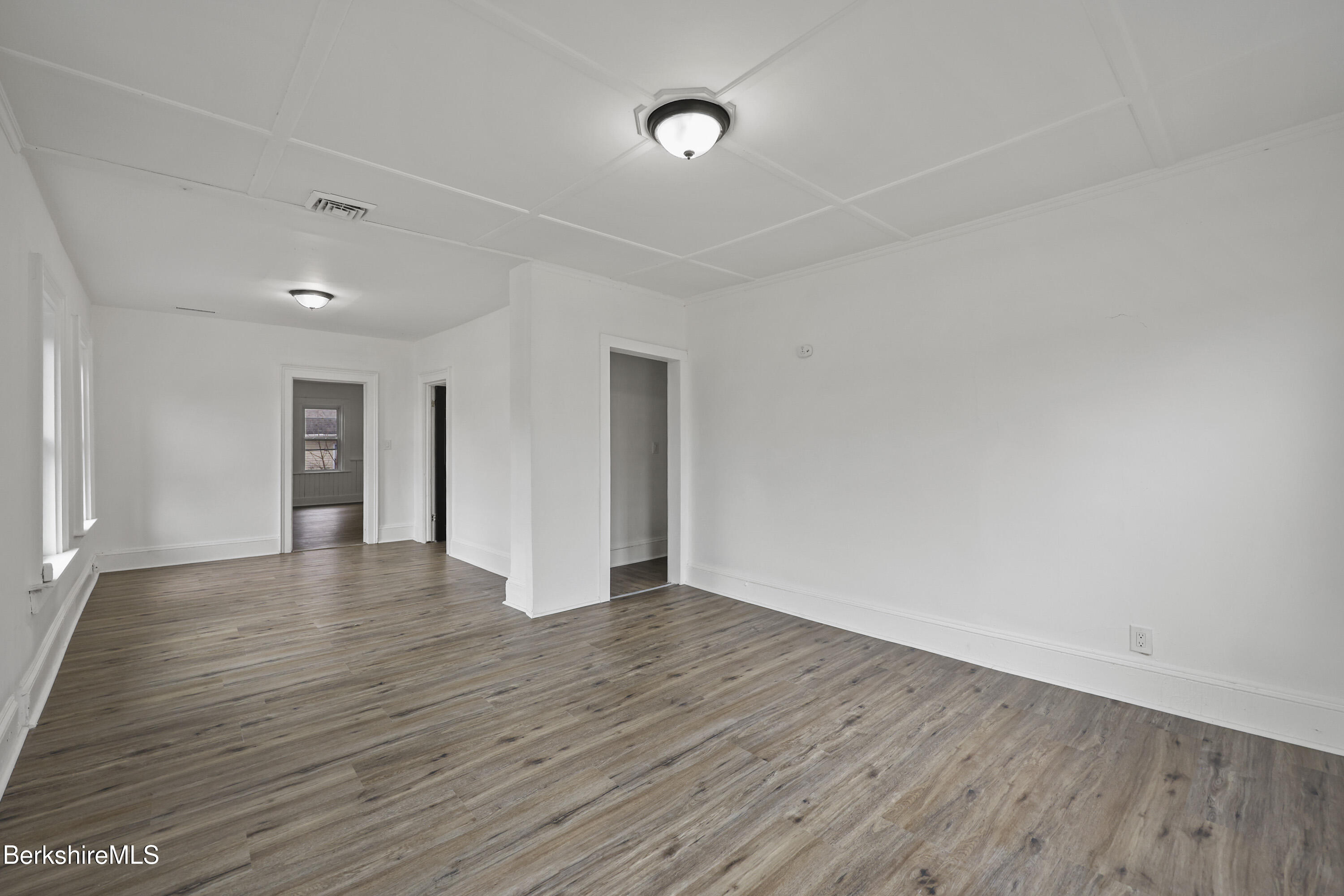 41 Prospect Street North Adams, MA 01247 - Photo 23 of 34 a view of an empty room with wooden floor