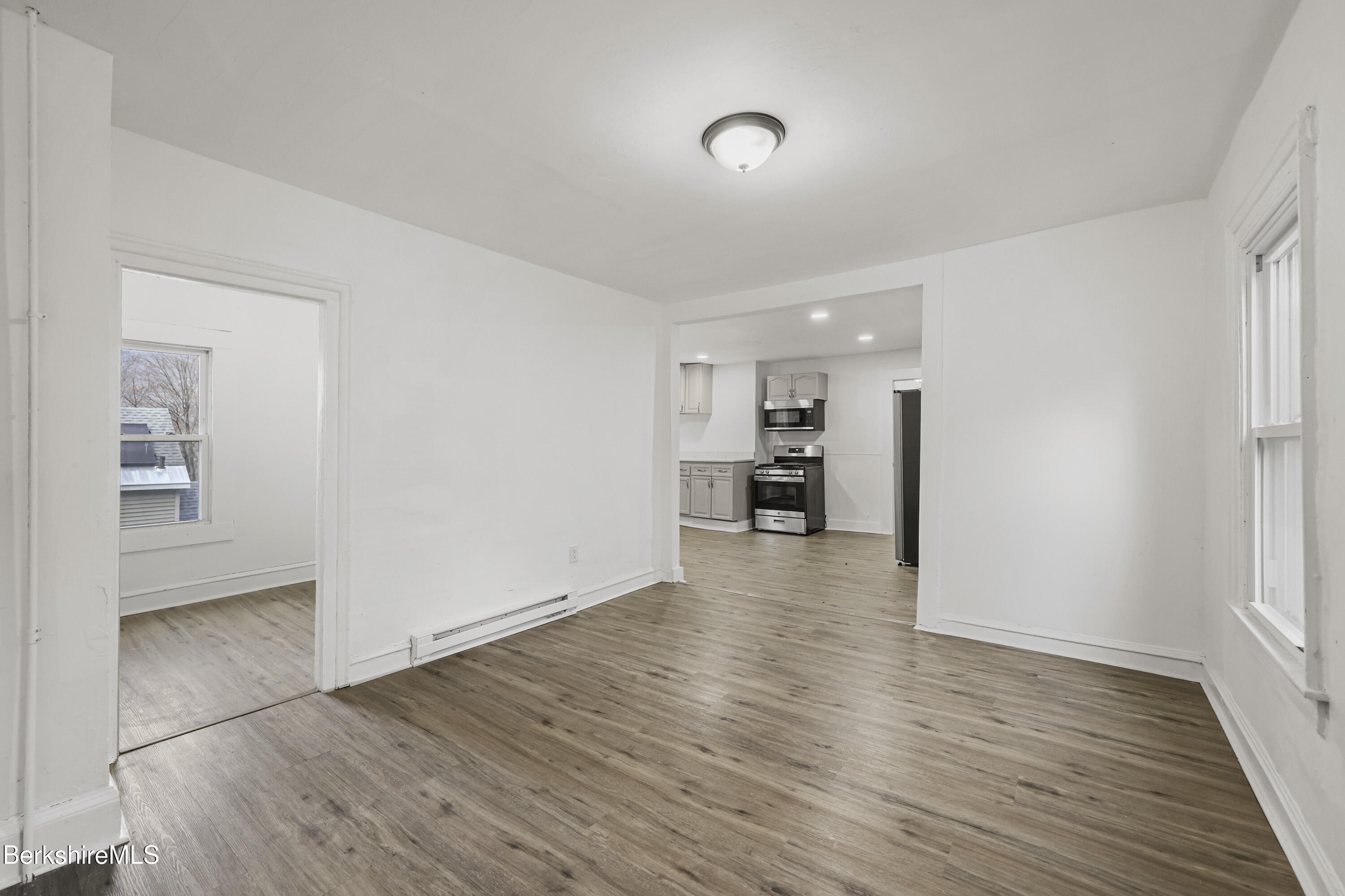 41 Prospect Street North Adams, MA 01247 - Photo 8 of 34 a view of empty room with wooden floor