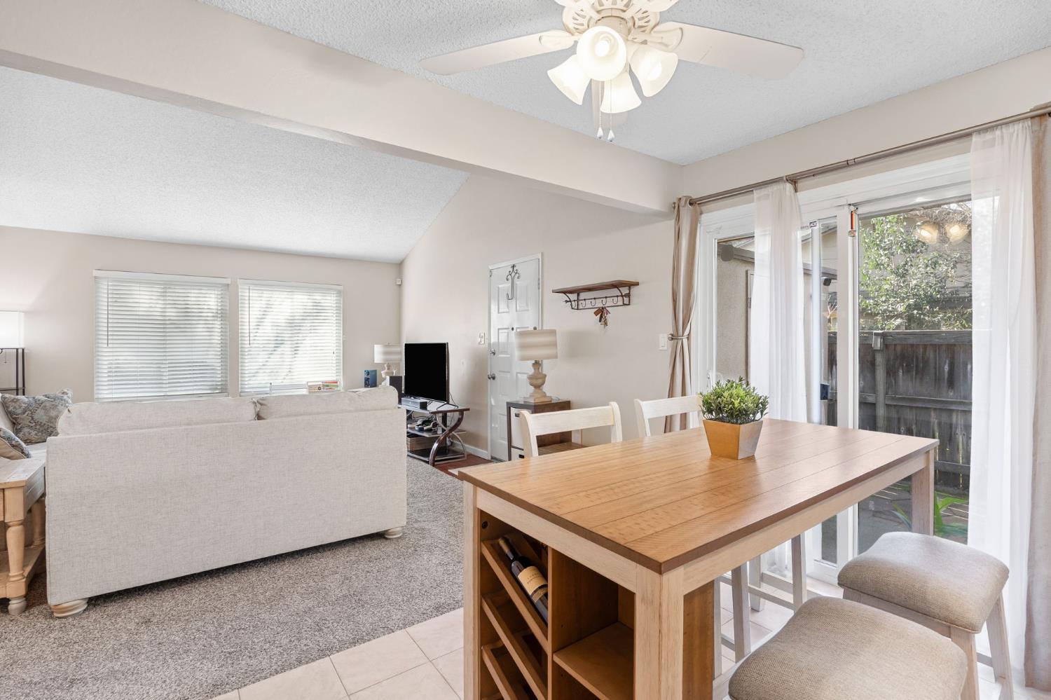 8849 La Riviera Drive, Unit A Sacramento, CA 95826 - Photo 7 of 19 a living room with furniture and window