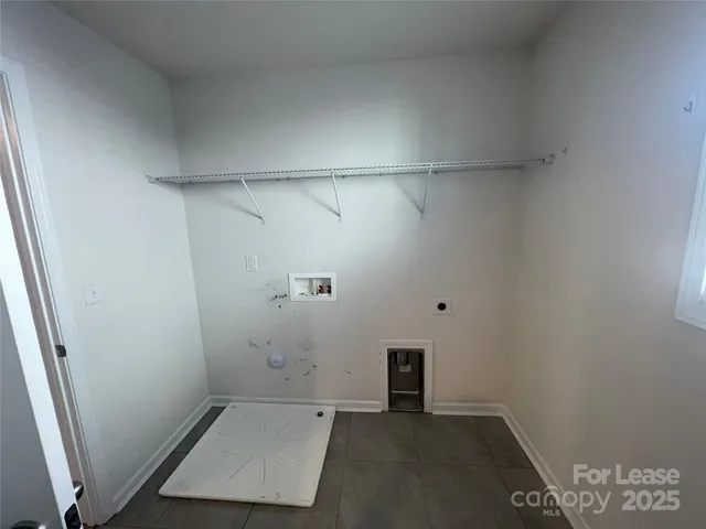 an empty room with a bench