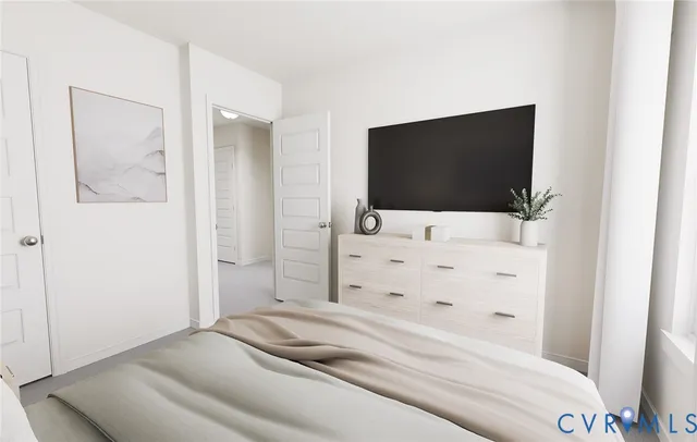 a bedroom with a bed and a mirror