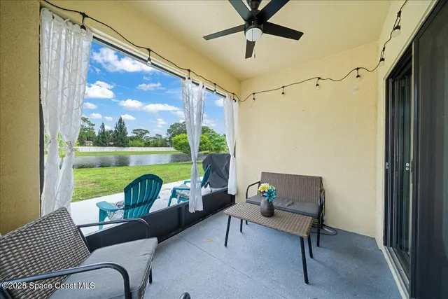 a lake view with a big yard