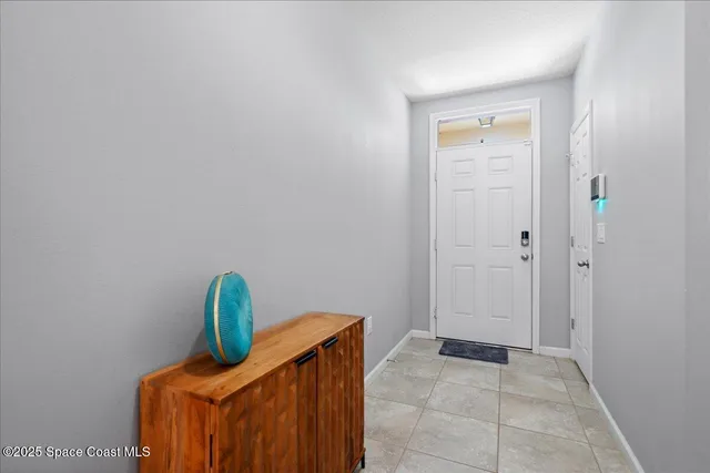 a view of a room that has dryer and washer