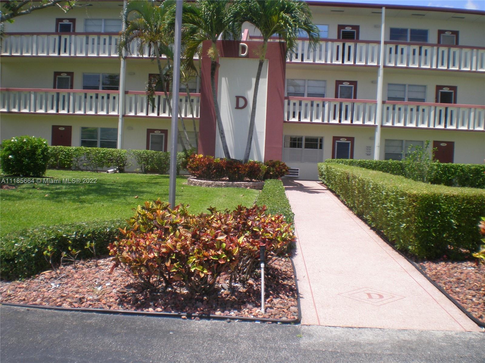 129 Brighton D, Unit 129 Boca Raton, FL 33434 - Photo 1 of 28 front view of a building