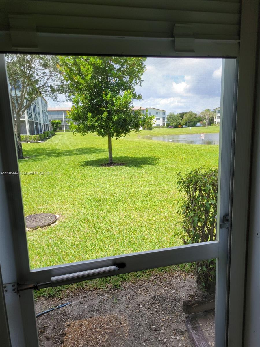 129 Brighton D, Unit 129 Boca Raton, FL 33434 - Photo 13 of 28 a view of a lot of an outdoor space