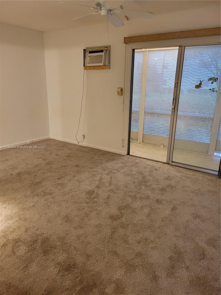 129 Brighton D, Unit 129 Boca Raton, FL 33434 - Photo 8 of 28 a view of an empty room