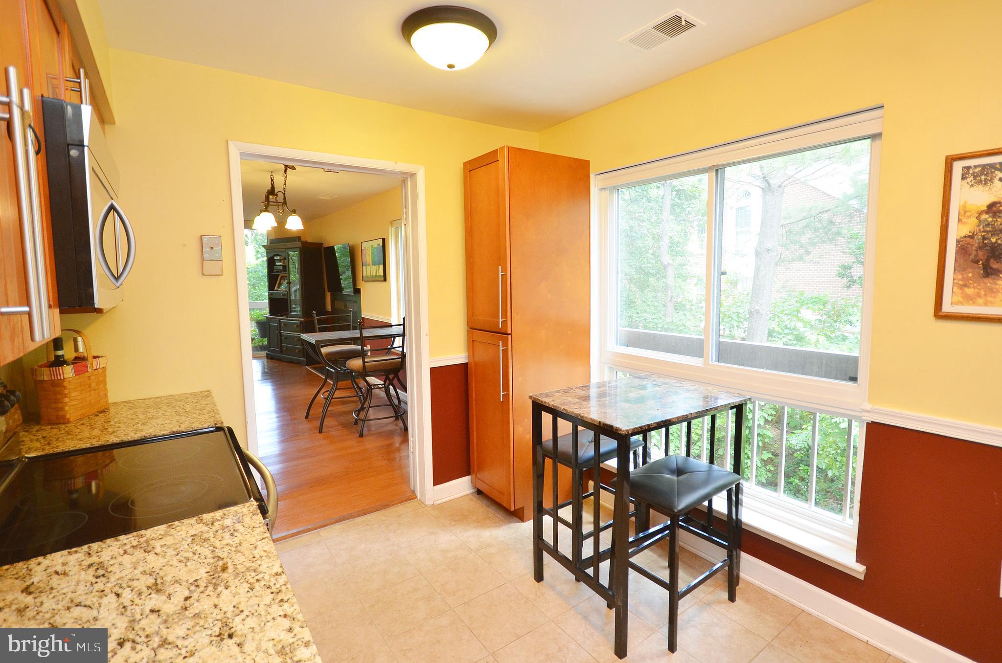 11214 Beaver Trail Court, Unit 12 Reston, VA 20191 - Photo 4 of 27 a view of a livingroom with furniture and a window