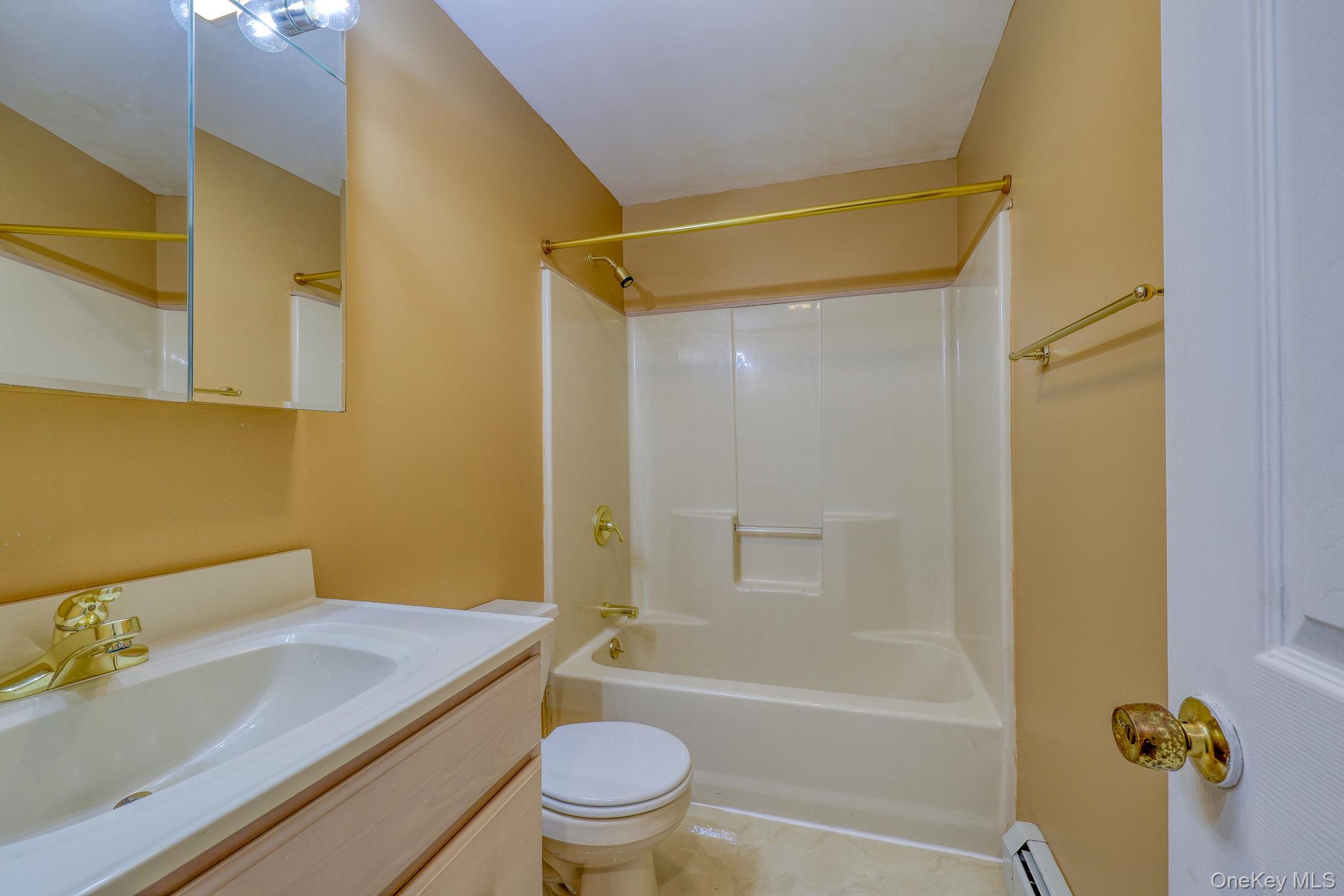 226 Big Woods Road Harris, NY 12742 - Photo 20 of 20 a bathroom with a sink toilet and shower