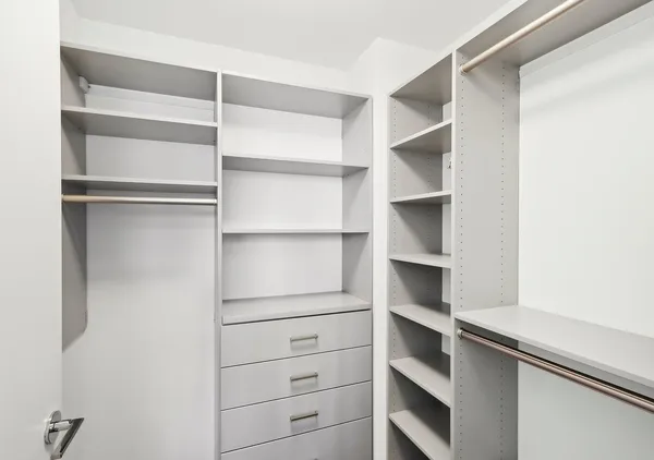 a view of a hallway with washer and dryer