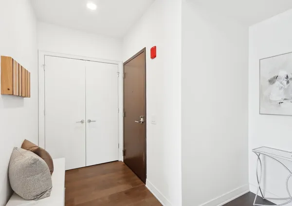 a room with furniture and a flat screen tv
