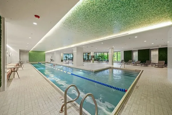 a view of gym room with gym equipment