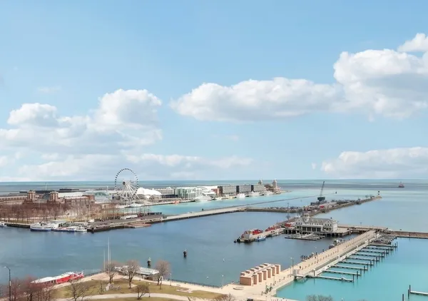 a kitchen with a sink and a large window