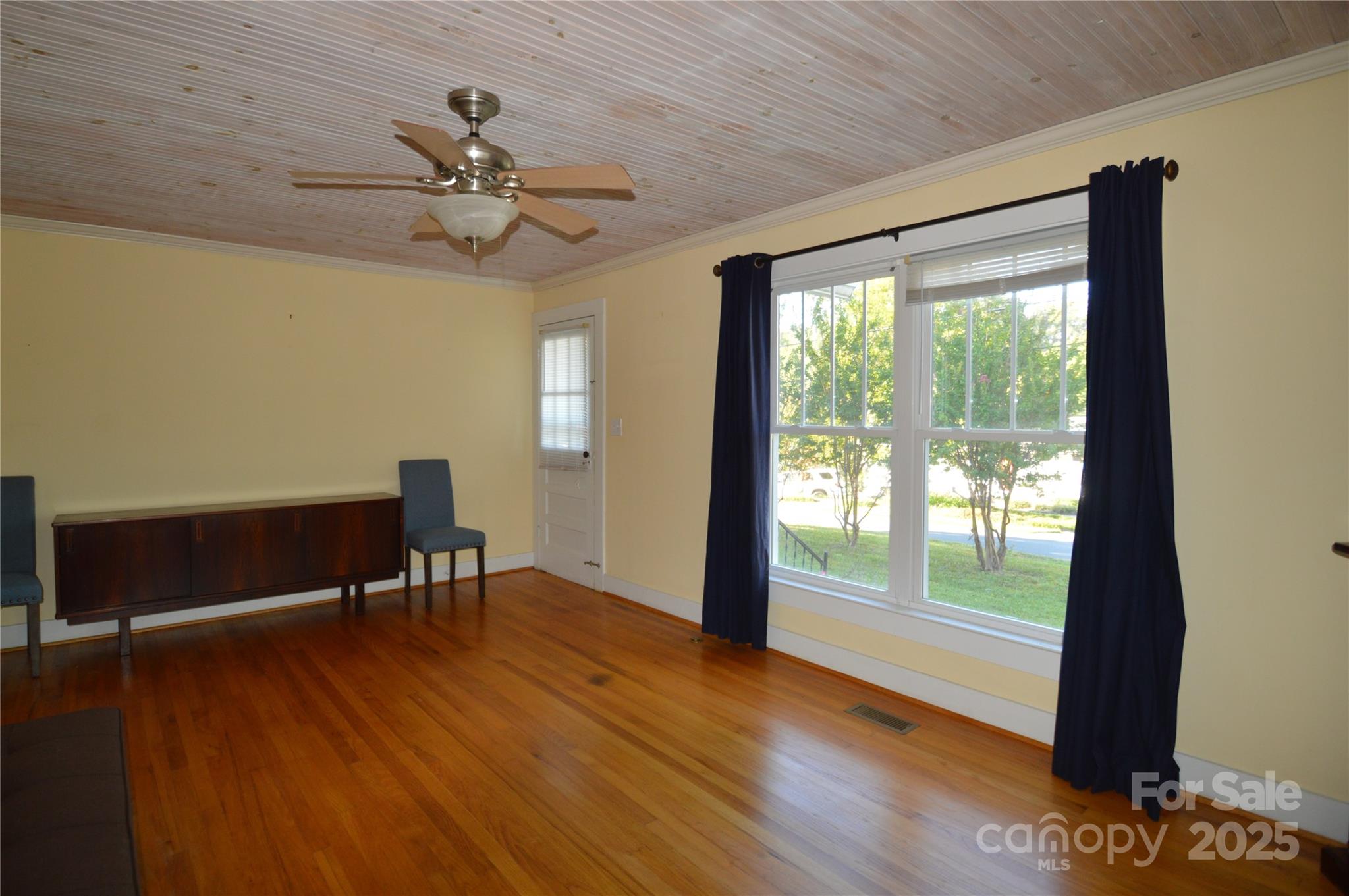 412 North Oak Avenue Landrum, SC 29356 - Photo 17 of 36 a view of a workspace with furniture and a window