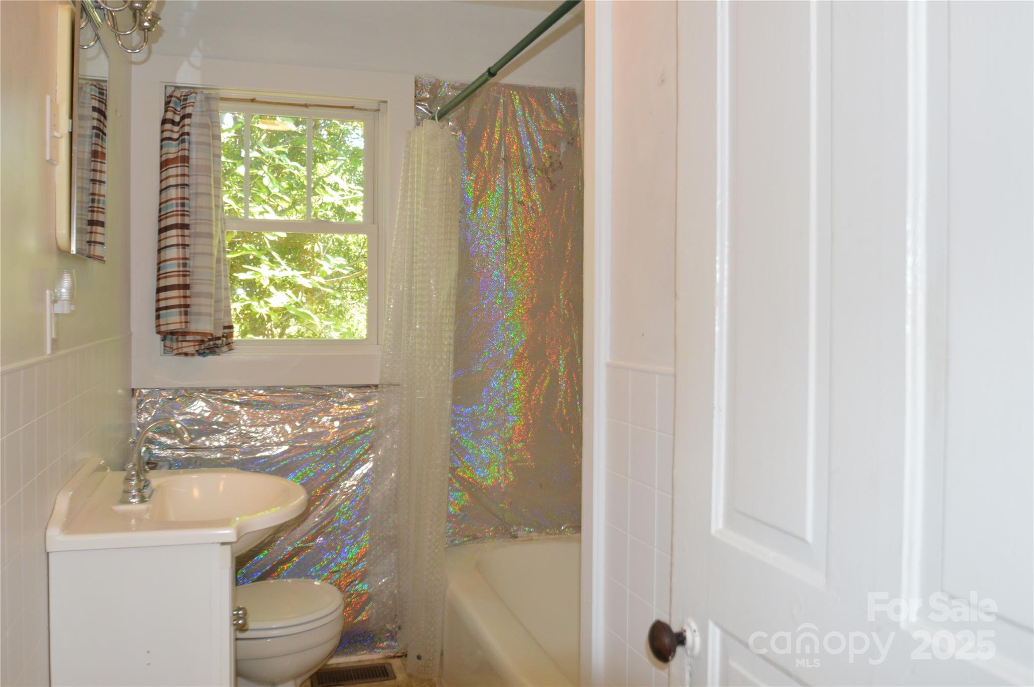 412 North Oak Avenue Landrum, SC 29356 - Photo 36 of 36 a bathroom with a sink toilet and shower