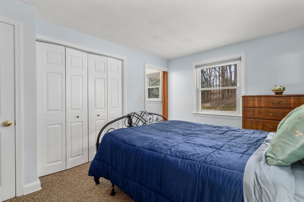 42 Gregory Road Framingham, MA 01701 - Photo 14 of 23 a bedroom with a bed and a window