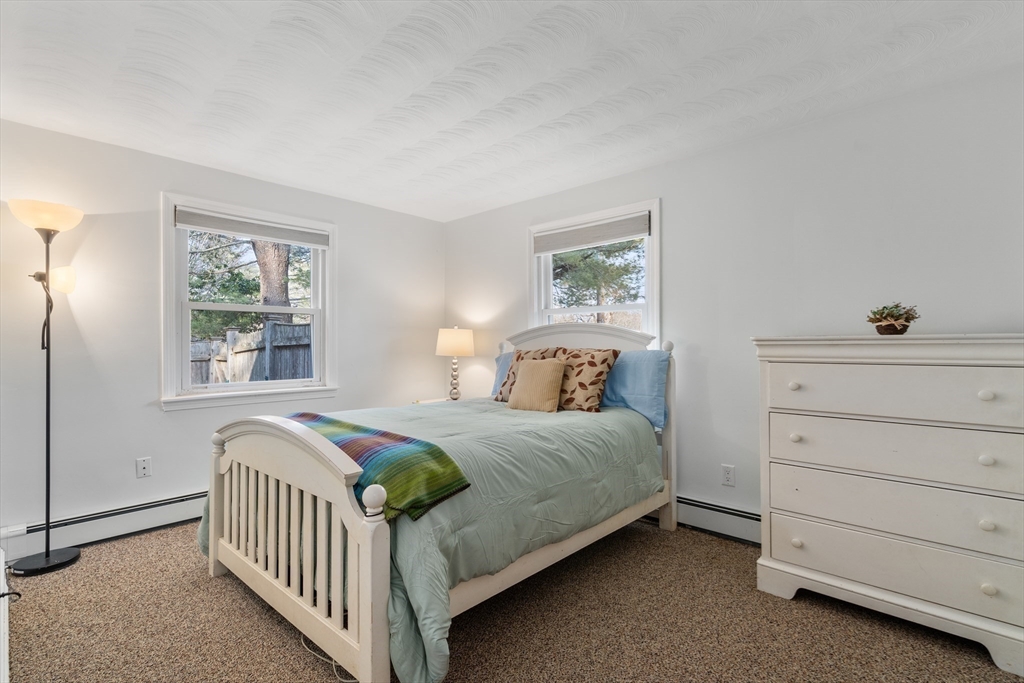 42 Gregory Road Framingham, MA 01701 - Photo 16 of 23 a bedroom with a bed and a window
