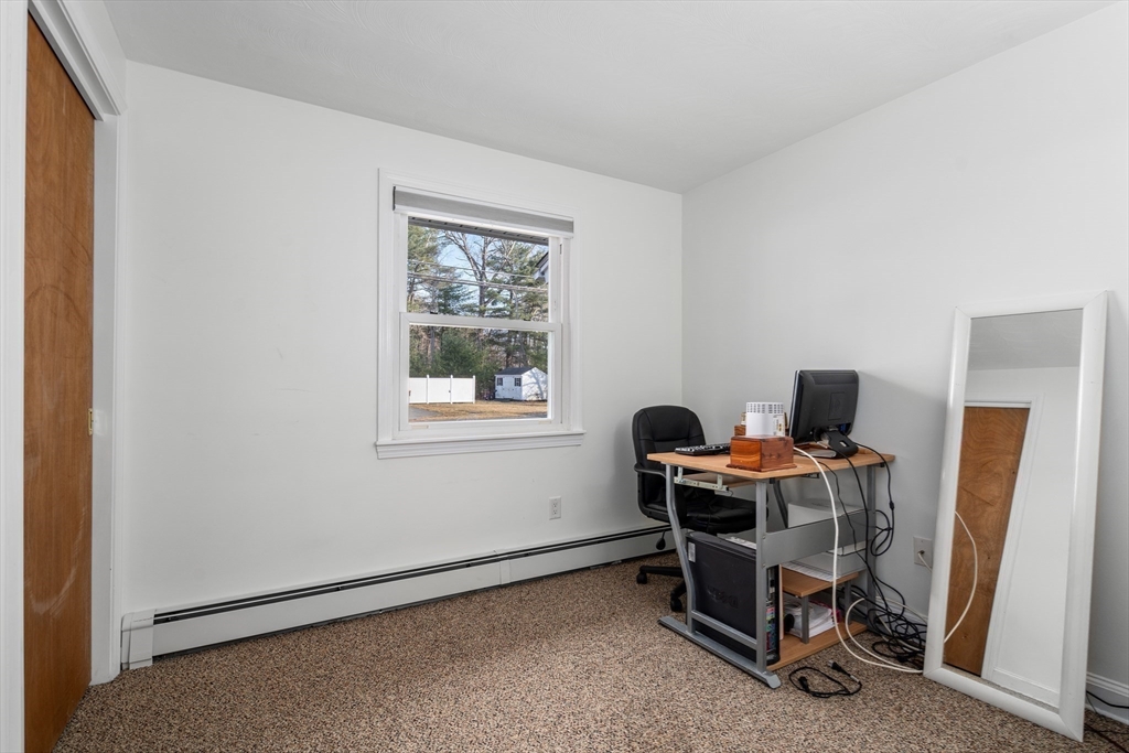 42 Gregory Road Framingham, MA 01701 - Photo 17 of 23 a work room with furniture and windows