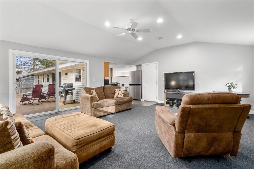 42 Gregory Road Framingham, MA 01701 - Photo 10 of 23 a living room with furniture and a flat screen tv