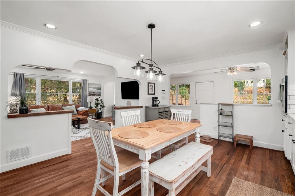 866 Buckner Road Mableton, GA 30126 - Photo 15 of 57 a view of a dining room with furniture window and wooden floor