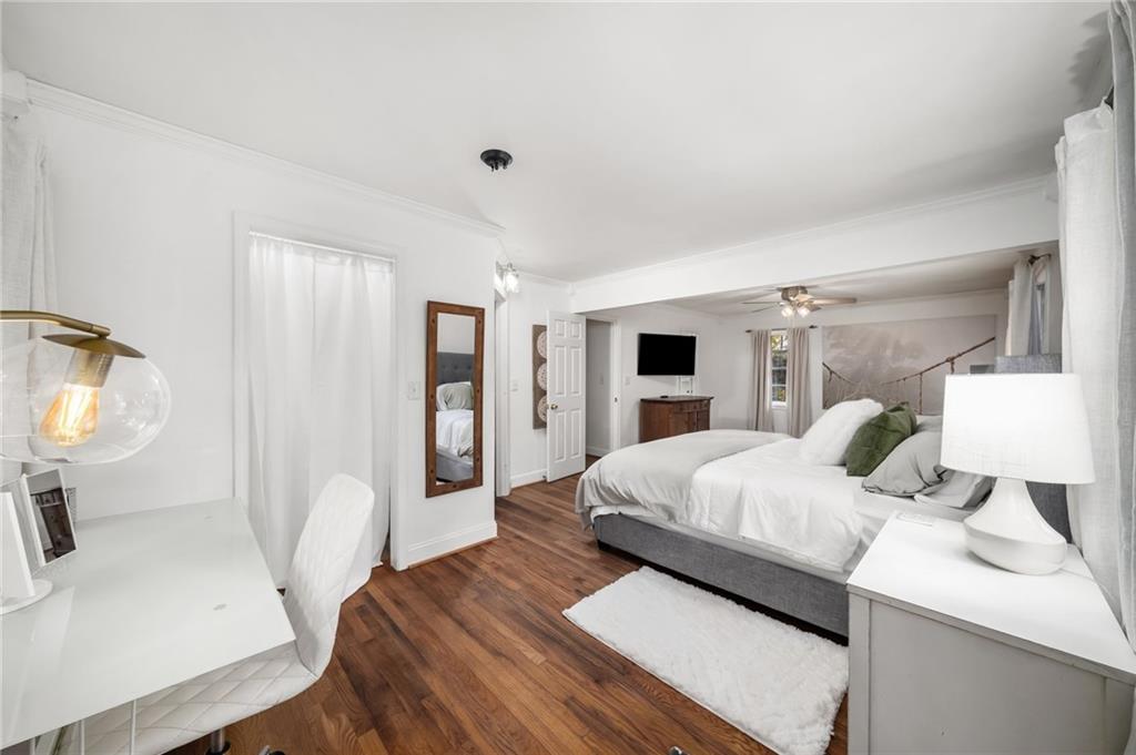 866 Buckner Road Mableton, GA 30126 - Photo 18 of 57 a bedroom with a bed and a white cabinets