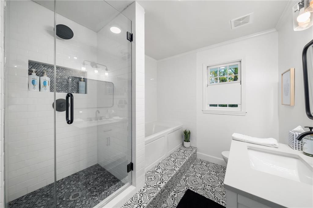 866 Buckner Road Mableton, GA 30126 - Photo 28 of 57 a bathroom with a shower and a toilet