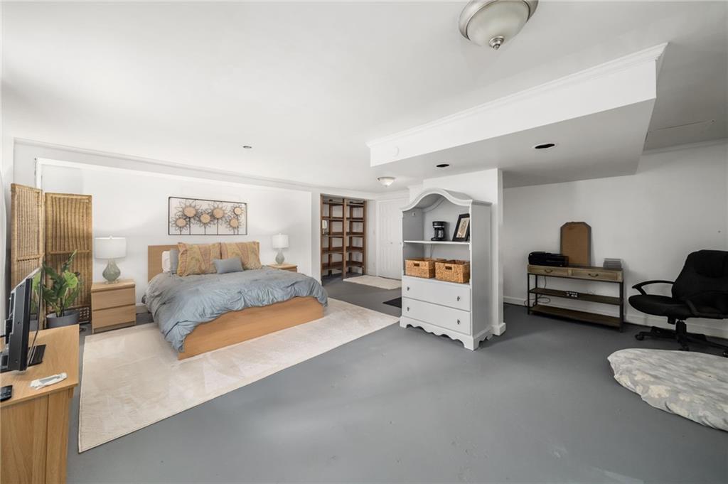 866 Buckner Road Mableton, GA 30126 - Photo 29 of 57 a bedroom with furniture and white walls