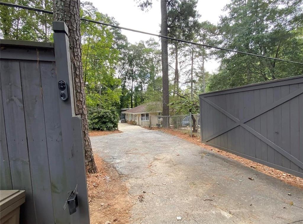 866 Buckner Road Mableton, GA 30126 - Photo 51 of 57 a view of a yard with a tree