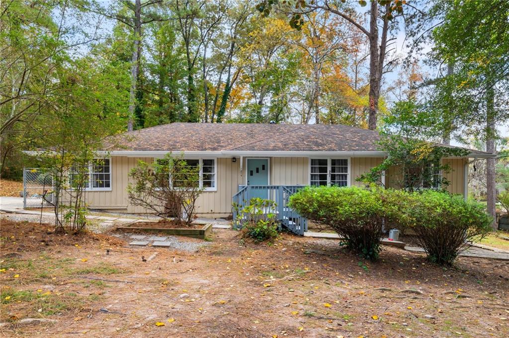 866 Buckner Road Mableton, GA 30126 - Photo 54 of 57 a front view of a house with garden