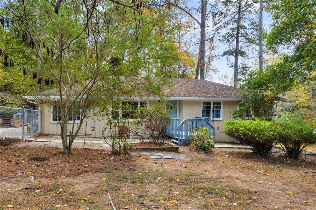 866 Buckner Road Mableton, GA 30126 - Photo 56 of 57 a front view of a house with garden