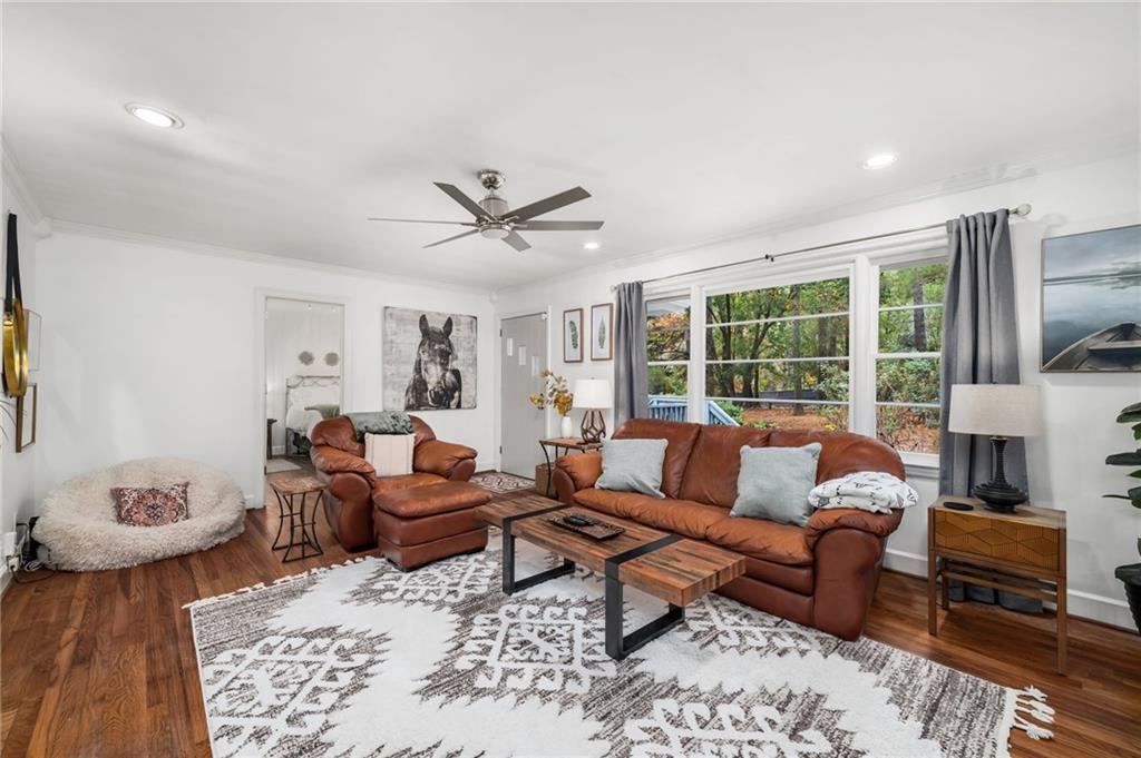 866 Buckner Road Mableton, GA 30126 - Photo 7 of 57 a living room with furniture and a floor to ceiling window