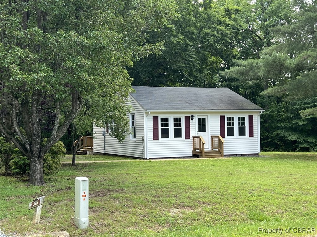 398 Philpot Road Locust Hill, VA 23092 - Photo 2 of 17 View of front of property with a front lawn and a shingled roof