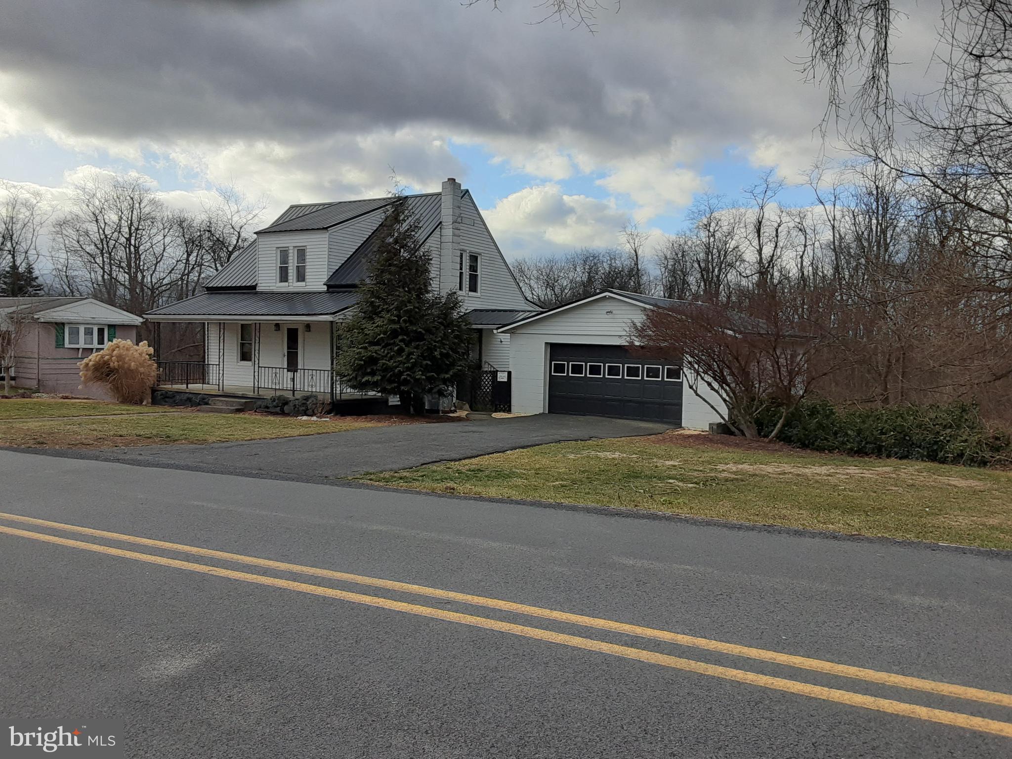 122 Loop Road Lewistown, PA 17044 - Photo 1 of 41 a view of the house with a street