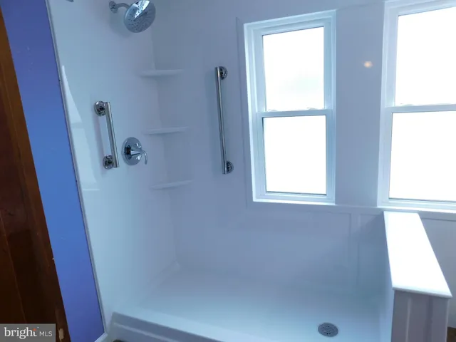a view of a storage & utility room with closet