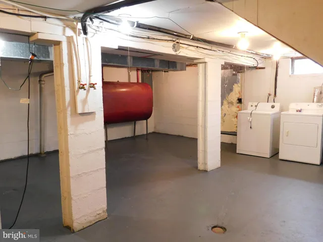 a view of a room with a ceiling fan